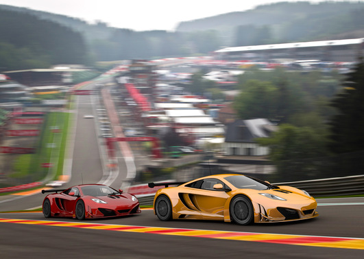 Yellow and Red Racecars Driving fast on Racing Track